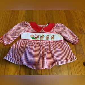 The cutest shirt/dress with Santa and Reindeer Design